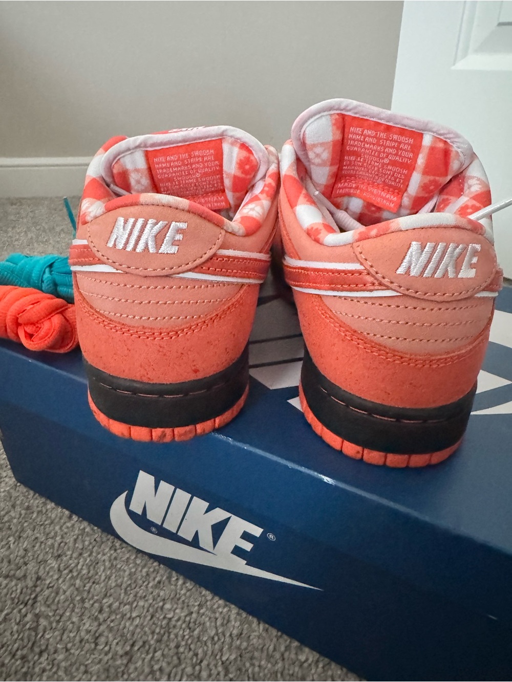 Nike Orange and White Checkerboard Low Top Sneakers - Picture 4 of 5